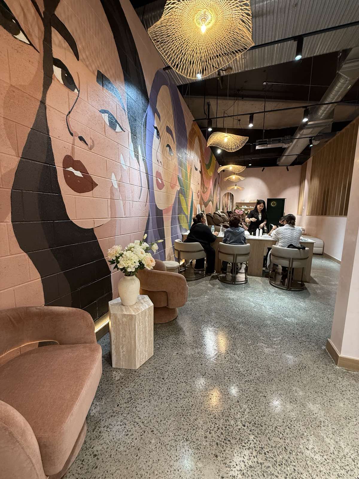 The mural and nail stations at Mi Galerie Marrickville Metro